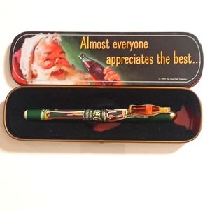 Coca-Cola Santa Claus collectors ballpoint pen with tin case. 1995 series